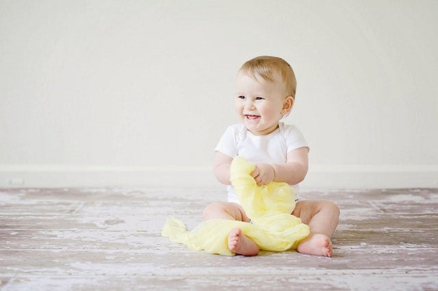 Baby with reusable nappies