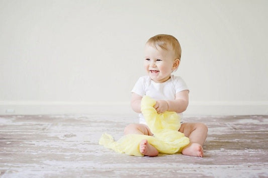 Baby with reusable nappies