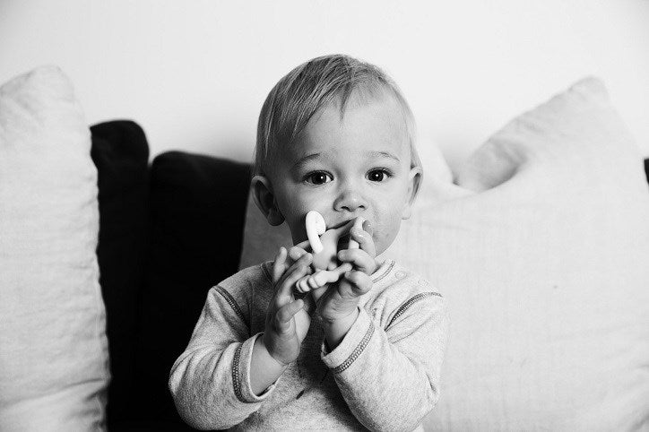 Baby with Matchstick Monkey Teether